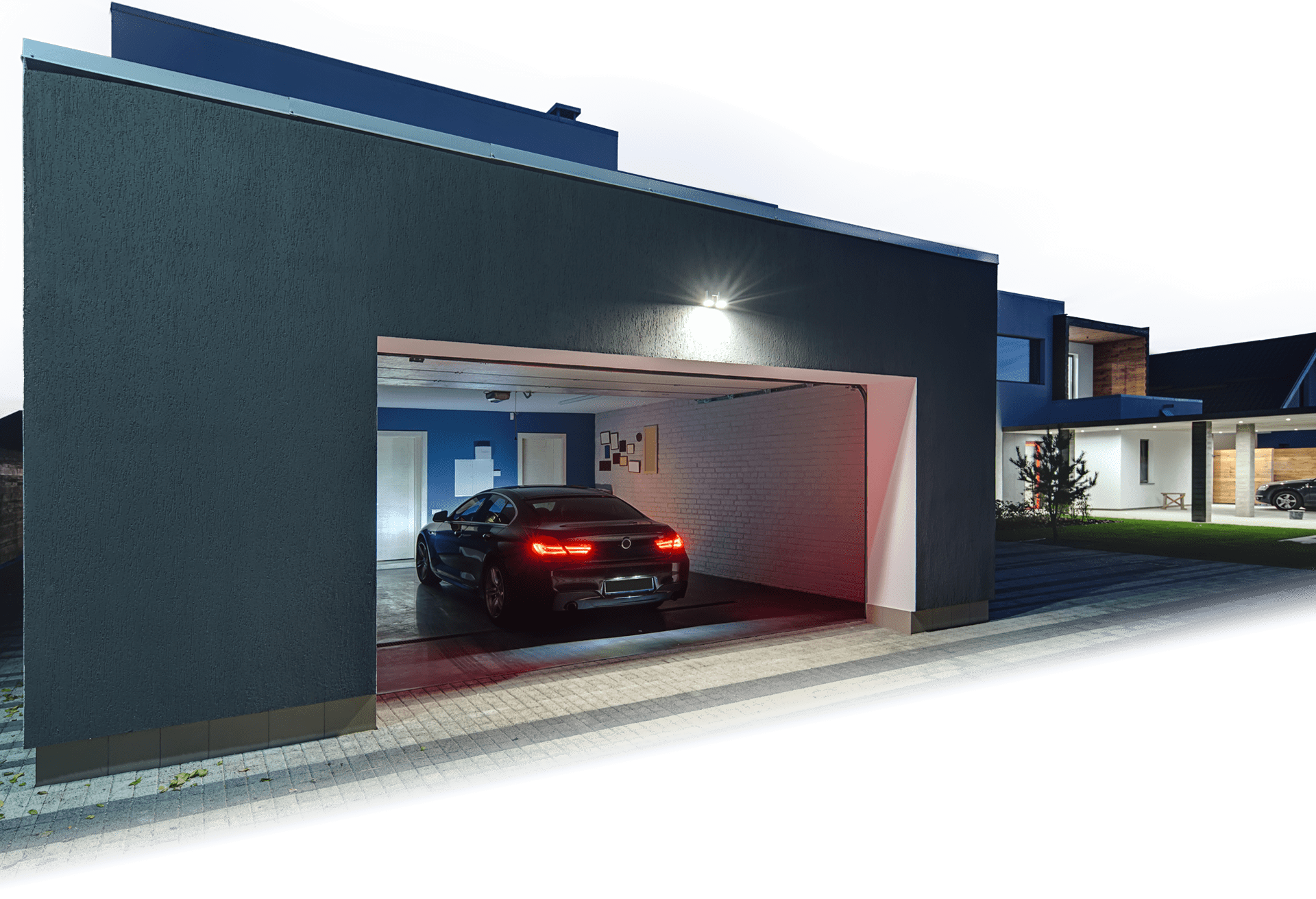 a vehicle that has just pulled into a garage and electric blue highlight of the house and the data being sent and received between the house and the vehicle