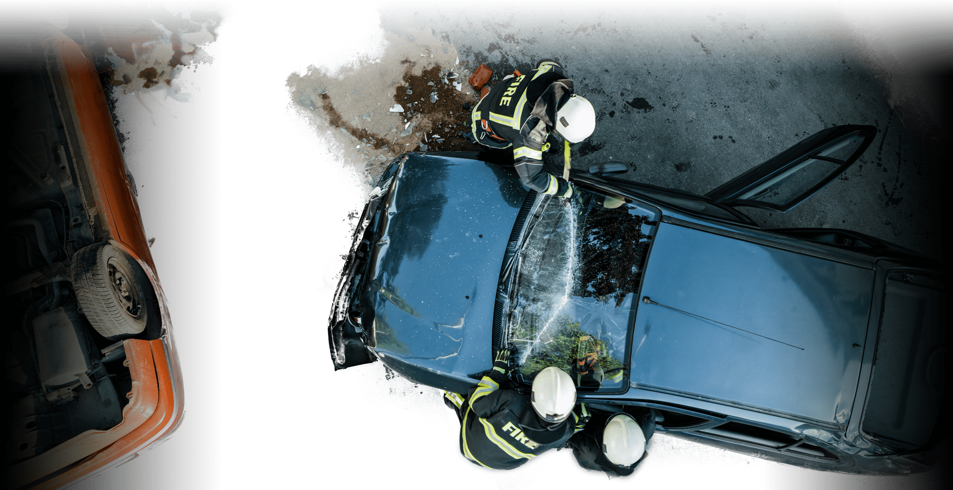 an overhead view of emergency responders are rescuing a motorist from a crashed vehicle